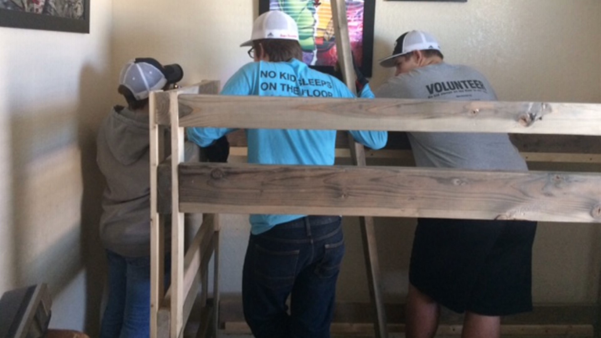 Boy Scouts deliver bunk beds to needy families